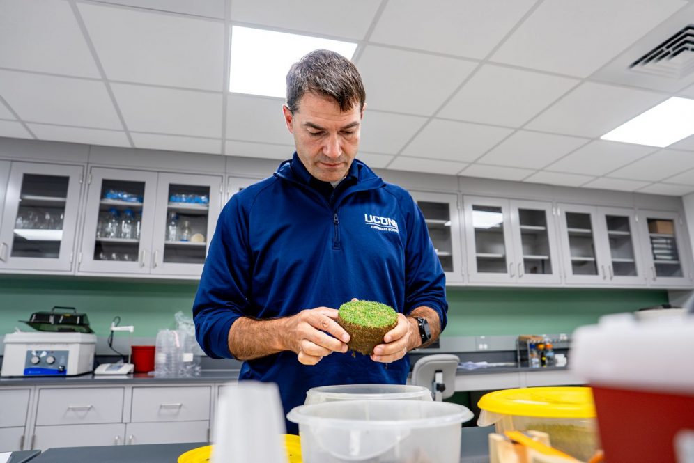 John Inguagiato reviews a turfgrass sample