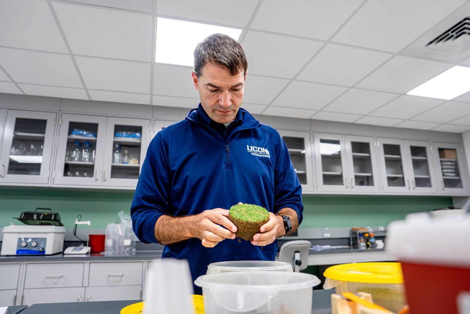 John Inguagiato reviews a turfgrass sample