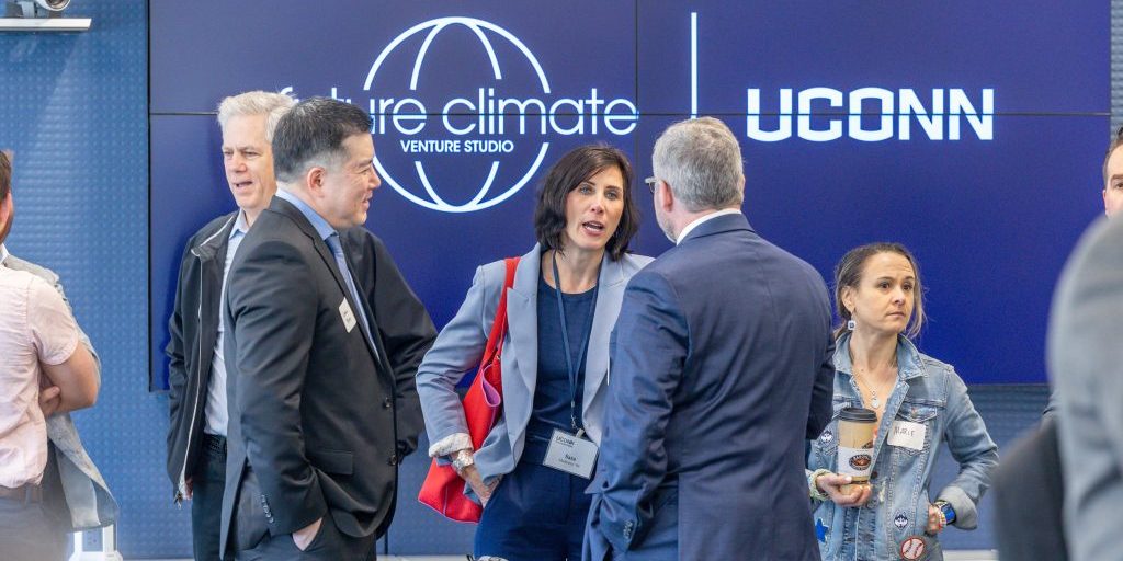 Attendees of the Future Climate Venture Studio showcase mingle prior to the presentations in the Innovation Partnership Building on April 20, 2023. (Sydney Herdle/UConn Photo)