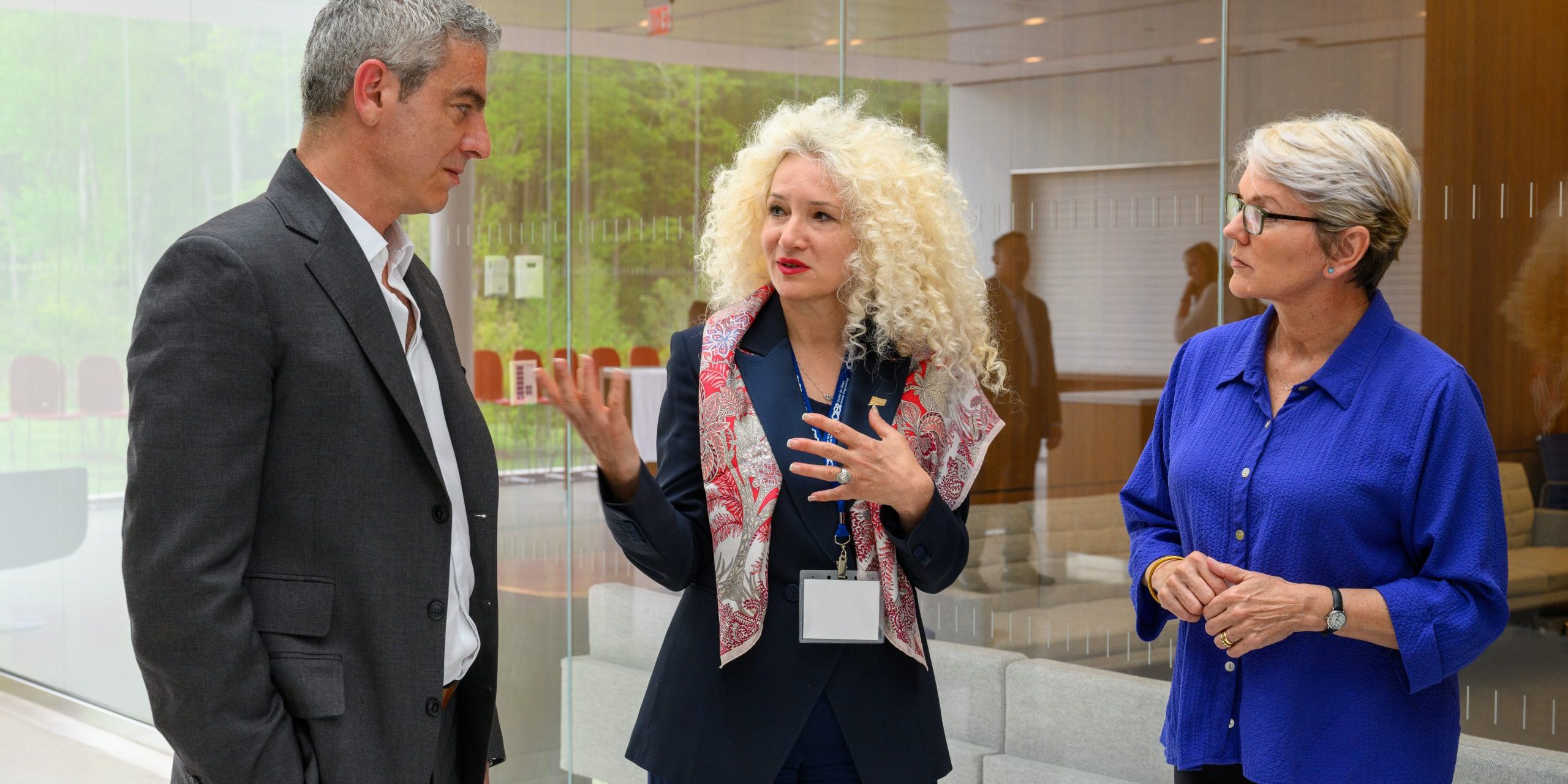 Radenka Maric, center, interim president, speaks with U.S. Secretary of Energy Jennifer Granholm, right, and George Bollas, director, institute for advanced systems engineering, on a visit to the Innovation Partnership Building